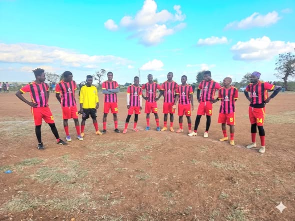 Tournament team lined up on the pitch